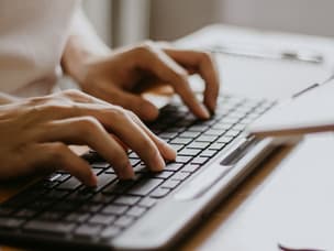 Fingers typing on keyboard for the new Google Ads privacy measures
