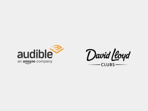 Person working out while listening to Audible amid the new David Lloyd partnership with Audible