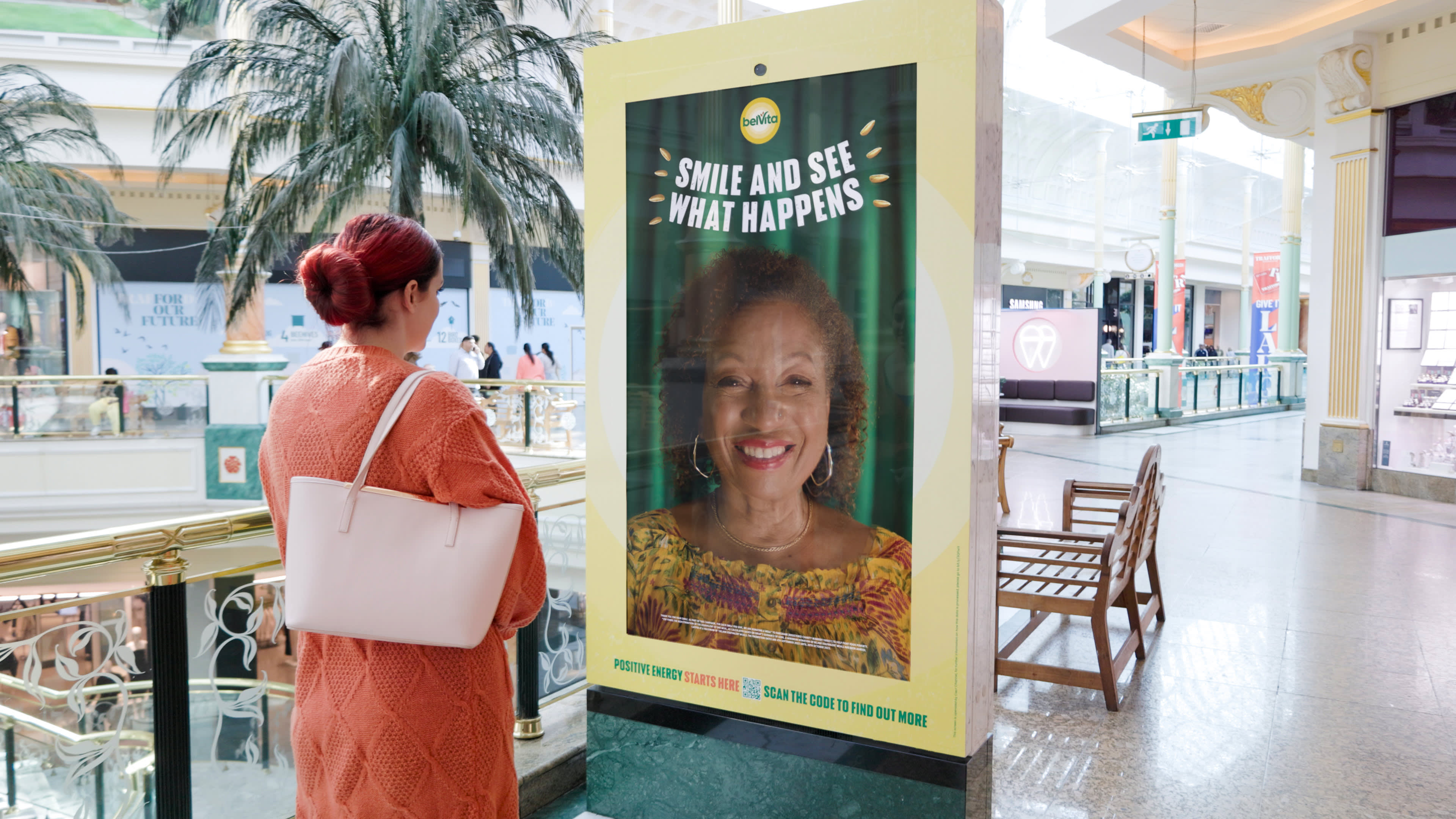 An interactive Belvita advertising screen inside a shopping mall